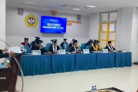 Teliti pemilih milenial antarkan Andik raih gelar doktor