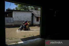 Banjir akibat luapan Sungai Cisadane