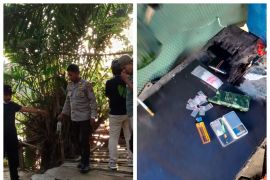 Polsek Tanjung Pura gerebek sarang narkoba di lahan sawit pinggir sungai Desa Pekubuan