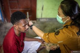 Membebaskan "pasung luka" di tepi belantara Merauke