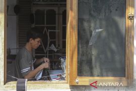 Penyaluran kredit usaha rakyat semester I 2025