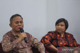 Indonesia's human rights ministry joins police reform push