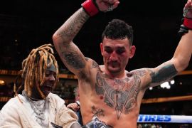 Hollloway merusak laga pensiun Poirier