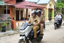 Gubsu dan Bupati Langkat jelajah Pulau Kampai Pangkalan Susu dengan sepeda motor