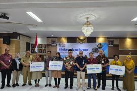 Empat tenaga kerja nonformal terima santunan kematian dari BPJS Ketenagakerjaan