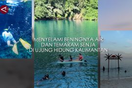 Menyelami beningnya air dan temaram senja di ujung hidung Kalimantan