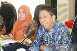 Kemenkum harmonikan regulasi perlindungan pedagang kecil Banjarmasin