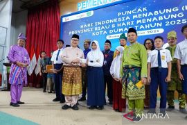 OJK dan Pemprov Riau Ajak Pelajar Menabung Sejak Dini