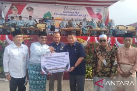 SKK Migas PetroChina Serahkan Bantuan Jalan 7,5 KM di HUT ke-60 Tanjung Jabung Barat