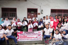 Rutan Kelas I Medan gelar jalan santai dan salurkan bansos peringati HUT ke-80 RI