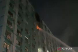 Kebakaran di Apartemen City Park, warga panik