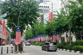 Bendera Malaysia dipasang di jalanan Kuala Lumpur jelang HUT Ke-68 Malaysia
