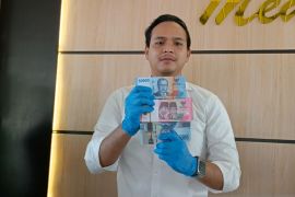 Polresta Pontianak-Kalbar tangkap tiga pembuat uang palsu