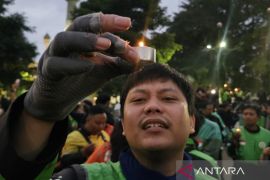 Pengendara ojol dan warga Kota Malang gelar aksi solidaritas bagi Affan