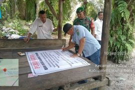 Kades Damuli Pekan pasang imbauan dan bongkar Jalur diduga peredaran narkoba