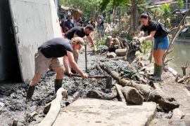 Lawmaker calls for stronger flood alert system after Bali floods