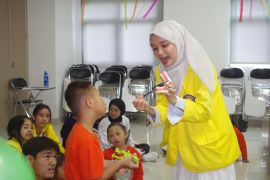 UI bersama POTADS beri edukasi gizi dan kesehatan anak "down syndrome"