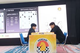 Susanto Megaranto  segel gelar Grand Master JAPFA Chess Festival
