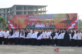 Kemenkum Riau Hadiri Apel Kebangsaan dan Launching Satgas PHK Provinsi Riau