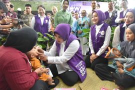 Tri Tito Karnavian pimpin pembinaan 6 SPM di Posyandu Palangka Raya