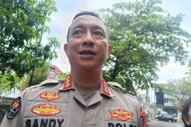 Bali police officer charged in human trafficking case