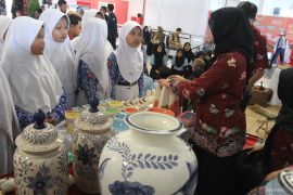 Upaya mendorong ekonomi kreatif melalui Festival Mbois