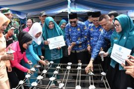 TP PKK Lombok Utara lestarikan terumbu karang di Pantai Impos