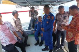 Tim gabungan patroli bersama usai kemunculan buaya di perairan Manado