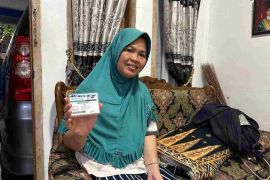 Anis syukuri hadirnya Program JKN di tengah keluarganya.