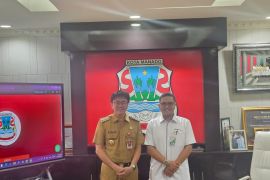 Pemkot Manado beri perlindungan BPJAMSOSTEK pada pengurus dan pengawas KMP