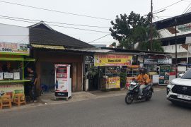 Kodim 0418/Palembangbantu bangun gerai KoperasiMerah Putih