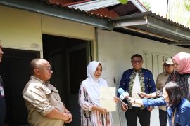 BPN datangi rumah warga Pekanbaru bagikan sertipikat tanah gratis PTSL