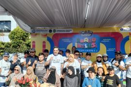 Kanwil Kemenkum Kalbar berikan layanan kekayaan intelektual pada acara jalan sehat MikroDOTS