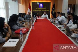 Penguatan Regulasi PMI, Kemenkum Riau Soroti Perlindungan Perbatasan