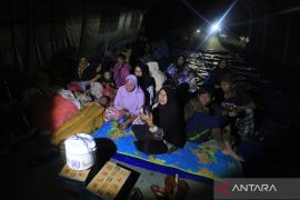 Indonesia races to restore power in flood-hit Aceh  