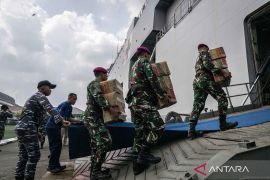 Indonesia deploys warships to boost aid distribution in flood-hit Aceh