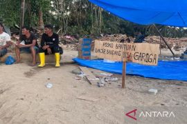 Tokoh Adat Garoga cerita duka desa yang hilang disapu tumpukkan kayu