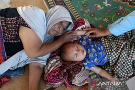 Kiat cegah ISPA di musim hujan dan banjir