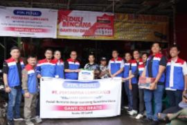 Korban banjir di Sumut dan Sumbar dapat layanan ganti oli motor gratis dari Pertamina Lubricants