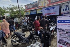 Pertamina membuka layanan ganti oli gratis  warga terdampak bencana