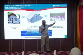 Indonesia speeds up housing recovery plan after Aceh floods