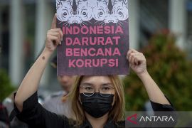 Aksi memperingati Hari Anti Korupsi Sedunia