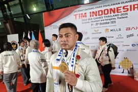 Atlet Made Sastra Dharma tabung uang dari bonus SEA Games