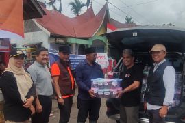 1 ton rendang pertama dari Ranah Minang sampai di Aceh dan Sumut