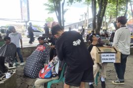 Komunitas seni rambut dan pijat Jambi galang dana bencana Sumatera