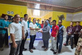 Tim PKM Unimed bantu warga terdampak banjir di Stabat