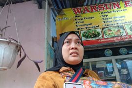 Kesedihan sejumlah warga TPU Kebon Nanas usai direlokasi ke rusunawa