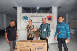 BPJS Ketenagakerjaan salurkan bantuan untuk korban banjir di Siau-Sitaro