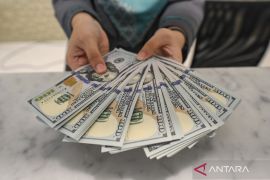 Rupiah menguat seiring daya beli masyarakat AS stagnan