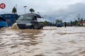 Hujan lebat sebabkan banjir di kota Palu